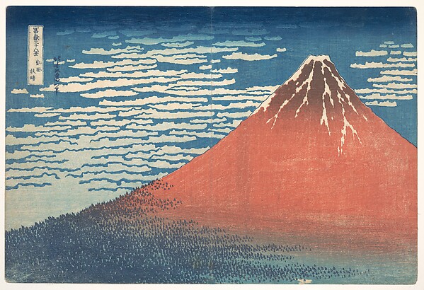 Mount Fuji rendered in deep red and ochre against a blue sky streaked with fine white cloud.